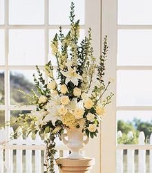 All white altar arrangement In Waterford Michigan Jacobsen's Flowers