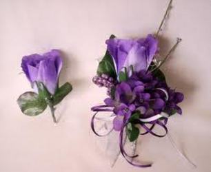 Purple homecoming corsage and bout In Waterford Michigan Jacobsen's Flowers